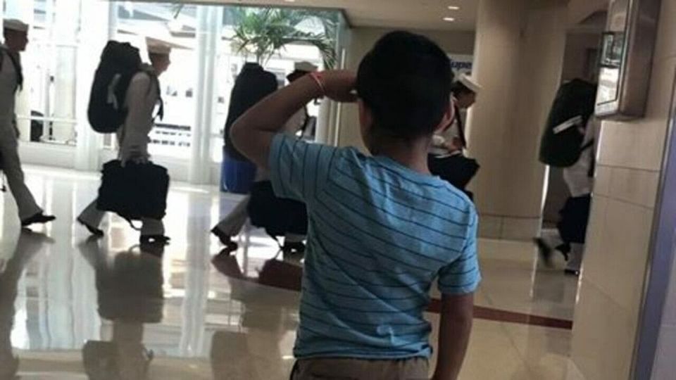 6-year-old boy goes viral after saluting military men at airport