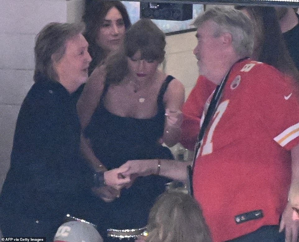 Swift (center) introduced Paul McCartney (left) to Travis Kelce’s dad Ed Kelce (right) inside a VIP suite at the Super Bowl on Sunday